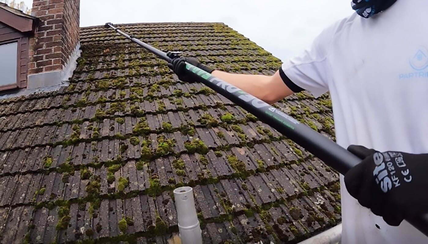 Clean residential roof after hand cleaning